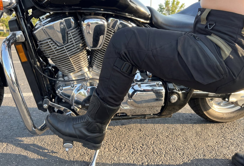 Customer photo. Close up of the knee of the black RoadArmor Women's pants on the bike